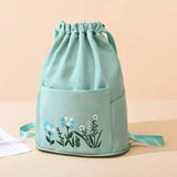 Sac à bandoulière brodé avec pochette à cordon