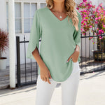 Chemise en mousseline de soie à col en V et à manches mi-longues, de couleur unie