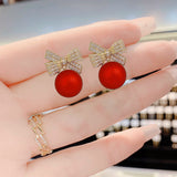 Boucles d'oreilles en perles papillon rouges