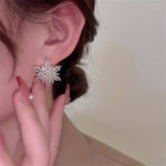 Boucles d'oreilles de luxe en forme de tournesol