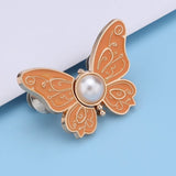 Boucle de taille papillon perle
