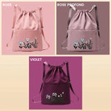 Sac à bandoulière brodé avec pochette à cordon