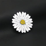 Broche en forme de roue tournante