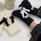 Gants magnétiques pour le maintien des mains