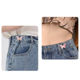 Boucle de taille papillon perle