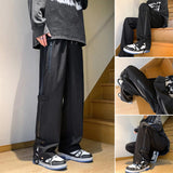 Pantalon droit à fermeture éclair triple défense