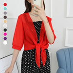 Cardigan scintillant en tissu fin de soie