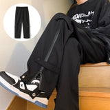 Pantalon droit à fermeture éclair triple défense