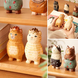 Ornement chaton sculpté en bois