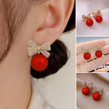Boucles d'oreilles en perles papillon rouges