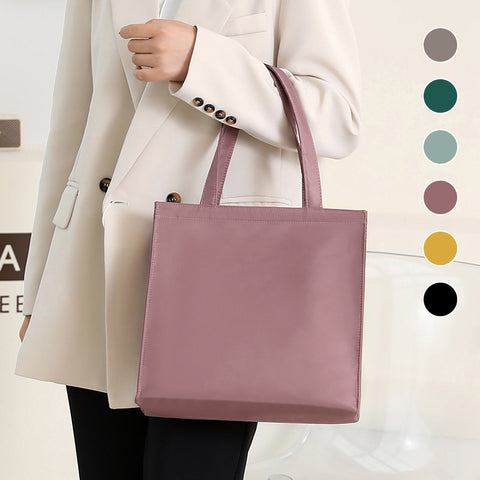 Sac à main de couleur unie