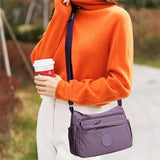 Sac bandoulière tendance uni à multiples poches zippées