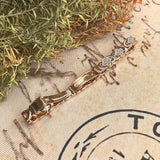 Pulsera de cobre con flores