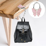 Crochet de sac pliable en forme de papillon