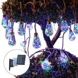Guirlande lumineuse avec ampoules suspendues à des cordes de jute