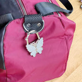Crochet de sac pliable en forme de papillon