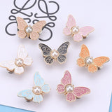 Boucle de taille papillon perle