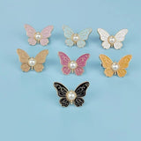 Boucle de taille papillon perle