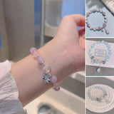 Bracelet imitation œil de chat cristal de papillon