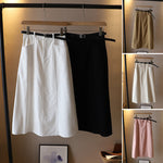 Jupe mi-corps A-line de couleur unie