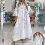 Robe en dentelle à manches évasées et col en V