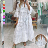 Robe en dentelle à manches évasées et col en V