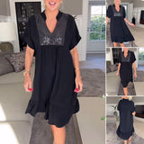 Robe plissée ample à col en V
