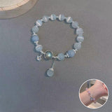 Bracelet imitation œil de chat cristal de papillon