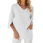 Chemise en mousseline de soie à col en V et à manches mi-longues, de couleur unie
