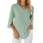 Chemise en mousseline de soie à col en V et à manches mi-longues, de couleur unie