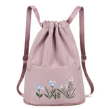 Sac à bandoulière brodé avec pochette à cordon