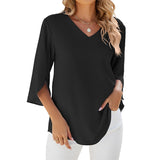 Chemise en mousseline de soie à col en V et à manches mi-longues, de couleur unie