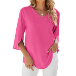 Chemise en mousseline de soie à col en V et à manches mi-longues, de couleur unie