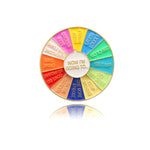 Broche en forme de roue tournante
