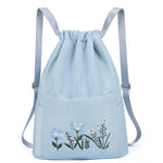 Sac à bandoulière brodé avec pochette à cordon