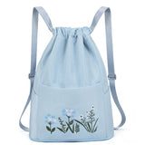 Sac à bandoulière brodé avec pochette à cordon