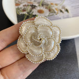 Broche Amherst