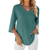 Chemise en mousseline de soie à col en V et à manches mi-longues, de couleur unie