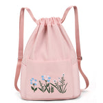 Sac à bandoulière brodé avec pochette à cordon