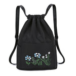 Sac à bandoulière brodé avec pochette à cordon