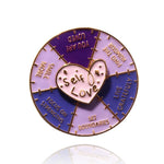 Broche en forme de roue tournante