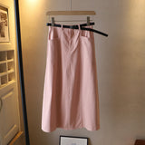 Jupe mi-corps A-line de couleur unie