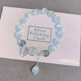 Bracelet imitation œil de chat cristal de papillon