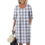 Robe trapèze à poches de couleur unie
