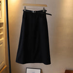 Jupe mi-corps A-line de couleur unie