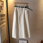 Jupe mi-corps A-line de couleur unie