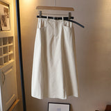 Jupe mi-corps A-line de couleur unie