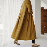 Robe en coton et lin à col rond de couleur unie