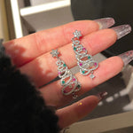 Boucles d'oreilles arbre de Noël brillant