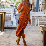 Robe formelle boutonnée à manches longues de couleur unie